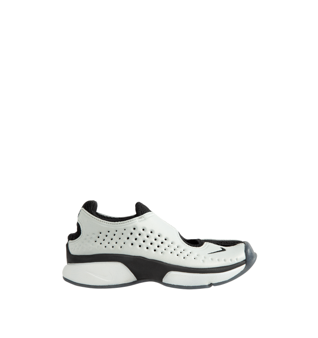Image 1 of 5 - WHITE - Nike Women's Rift II Sneakers are a one-to-one reissue of the sought-after 2002 update to the iconic Air Rift and feature a streamlined slip-on silhouette, a flexible upper with breathable mesh underlays, and the signature split-toe design. This lightweight sneaker revives a cult-favorite look while maintaining the performance-inspired details that made the original a standout. Main Material: Textile and Synthetic Upper with Mesh Underlays.