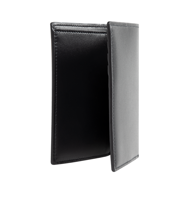 Image 2 of 3 - BLACK - SAINT LAURENT Credit Card Wallet featuirng single-fold wallet embossed with a Saint Laurent Paris signature, silver-toned metal hardware, four credit card slots, two receipt compartments and one bill compartment. 3.5 x 4.5 x 0.8 inches. Calfskin. Made in Italy.