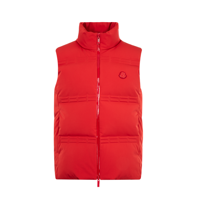 Image 1 of 3 - RED - Moncler x A$AP Rocky Sparky Down Vest featuring 2L 4-way stretch nylon, nylon laqu lining, down-filled, zipper closure, zipped pockets, embossed details and logo patches. 87% polyamide/nylon, 13% elastane/spandex. Padding: 90% down, 10% feather.