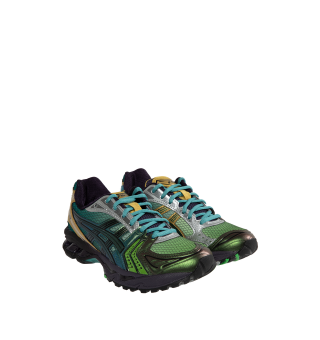 Image 2 of 5 - GREEN - Asics GEL-KAYANO 14 sneaker inspired by earth tones found in nature and incorporating rip-stop underlays and tonal color blocking for a technical appearance. Mirroring the original midsole tooling with GEL technology cushioning, this shoe helps create advanced cushioning in everyday scenarios. Features Original inspired tooling, GEL technology cushioning for shock absorption, and TRUSSTIC support system.