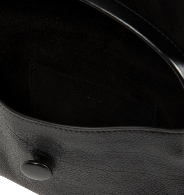 Image 3 of 3 - BLACK - The Row Sally Bag is crafted from waxed calfskin leather and features a compact top-handle silhouette with a flat handle, a flap closure, and a leather-covered button for a clean, minimalist finish. This designer leather handbag combines exceptional Italian craftsmanship with timeless elegance, making it an effortless choice for carrying everyday essentials. Main Material: 100% Calfskin Leather. Lining: 100% Lambskin Leather. Dimensions: 7.1 x 4.7 x 1.2 in. Made in Italy