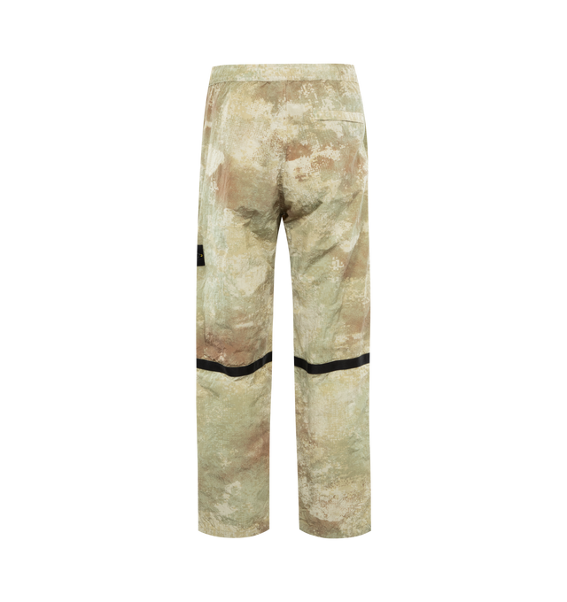 Image 2 of 3 - GREEN - STONE ISLAND Printed Trousers featuring ECONYL regenerated nylon taffeta, graphic pattern printed throughout, concealed drawstring at elasticized waistband, three-pocket styling, vent and webbing trim at knees, bungee-style drawstring at cuffs, detachable felted logo patch at outseam and full nylon mesh lining. 100% regenerated polyamide. Made in Viet Nam. 