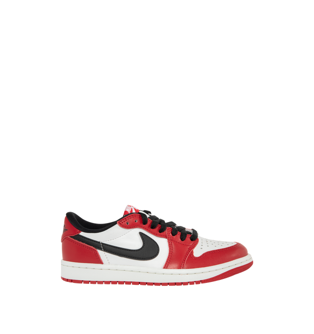 Image 1 of 5 - RED - JORDAN Air Jordan 1 Low OG Sneaker featuring genuine leather in the upper, Nike Air technology, lace up closure, rubber in the outsole for durable traction and wings logo on heel.