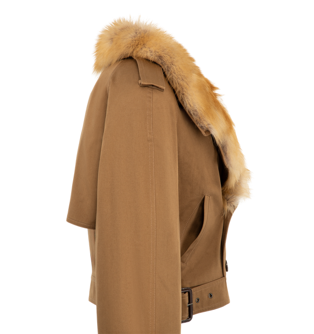 Image 3 of 3 - BROWN - Saint Laurent Women's Shearling-Trimmed Trench Coat is crafted from cotton gabardine and lamb shearling and features a slightly loose silhouette with wide lapels, a button-front closure, and contrasting shearling trim. From the Fall/Winter 2026 collection, this hybrid trench combines classic tailoring with plush texture, featuring a shearling-lined interior, cropped hem detailing, and added warmth for colder weather. Main Material: 50% Cotton, 50% Lambskin. *This item may be restrict