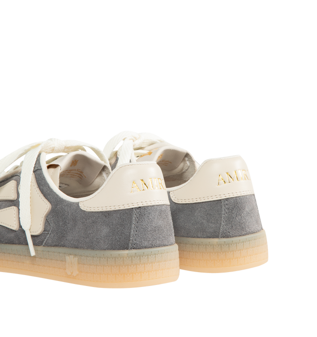 Image 3 of 5 - GREY - AMIRI Pacific Bones Sneakers in suede featuring low-top, signature bone appliqus on the sides, flat heel, round T-toe, lace-up vamp, woven MA tongue label, backstay logo and rubber outsole.