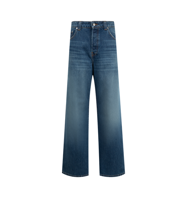 Image 1 of 3 - BLUE - KHAITE Winslow Jean featuring an oversized fit, wide-leg, button-fly, classic five-pocket denim detailing and a dropped rise. 100% cotton.