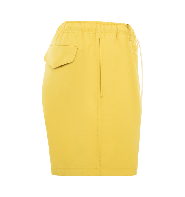 Image 3 of 3 - YELLOW - AURALEE Wool Max Canvas Shorts featuring wide fit, short length, belt loops and elasticated drawstring waistband. 100% wool.