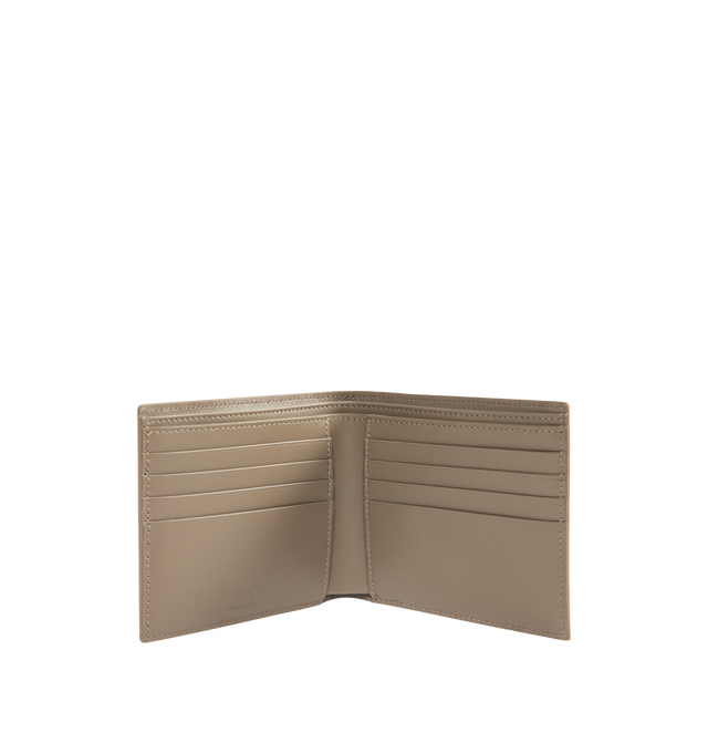 Image 3 of 3 - BROWN - SAINT LAURENT East West Wallet featuring single-fold wallet with embossed signature, leather lining, silver-toned hardware, eight card slots, two bill compartments and two receipt compartments. 4.5" x 3.7" x 0.6". Calfskin leather. Made in Italy.