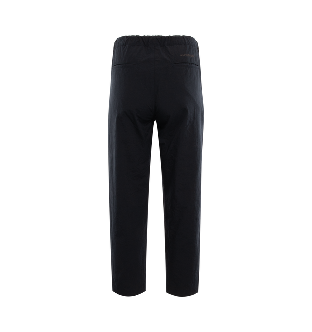 Image 2 of 3 - BLUE - AND WANDER nylon chino pants, with their tapered design, are versitile and rugged featuring 2 side pockets, button closure, tapered leg and dart detail. 100% Nylon. 