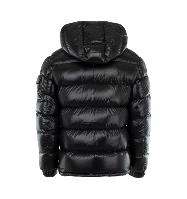 Image 2 of 3 - BLACK - MONCLER Maya Jacket featuring nylon laqu lining, down-filled with boudin quilting, detachable hood with snap buttons, adjustable with drawstring fastening, two-way zipper closure, zipped pockets, adjustable, elasticized cuffs with snap buttons, hem with drawstring fastening, flap patch pocket on sleeve and felt Moncler logo on sleeve. 100% polyamide/nylon. Padding: 90% down, 10% feather.