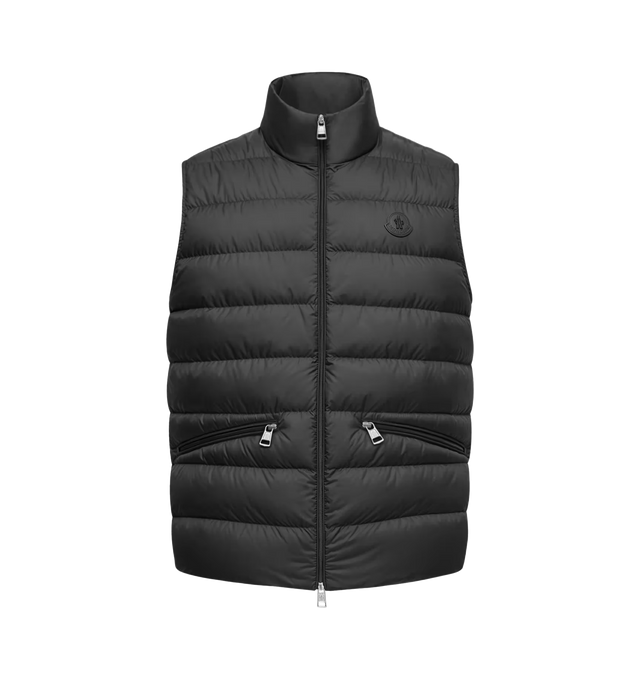 Image 1 of 1 - BLACK - Moncler Mens Treompan Down Vest is crafted from Airsoft with a water-repellent finish. Features a stand collar with snap-button closure, zip-front closure, zipped pockets, down-filled construction, and leather logo patch. Exterior: 100% Polyester; Lining: 100% Polyester; Padding: 90% Down, 10% Feather; Leather Tag: Cow Leather. Made in Romania.
