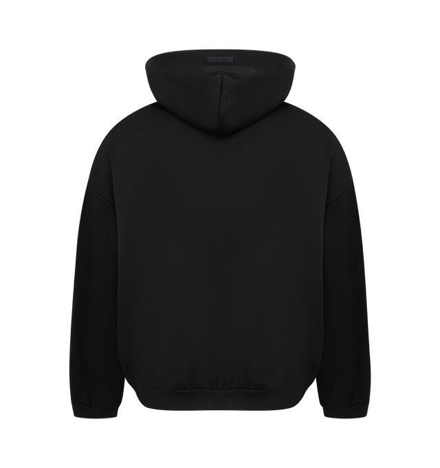 Image 2 of 3 - BLACK - FEAR OF GOD ESSENTIALS 90s Fit Fleece Hoodie featuring cotton-blend fleece hoodie, rubber logo patch at hood, logo appliqus at front, seam pockets at waist, rib-knit hem and cuffs and dropped shoulders. 80% cotton, 20% polyester.