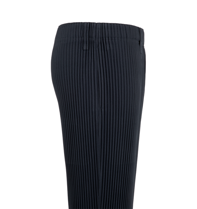 Image 3 of 3 - NAVY - Issey Miyake Pleats Pants are sporty straight pants. They are characterized by their portability and light comfort with the unique quick-drying property of polyester material. There are pockets on both sides and a drawcord at the waist, along with a button-fly design. Material: 100% Polyester. Made In Japan.