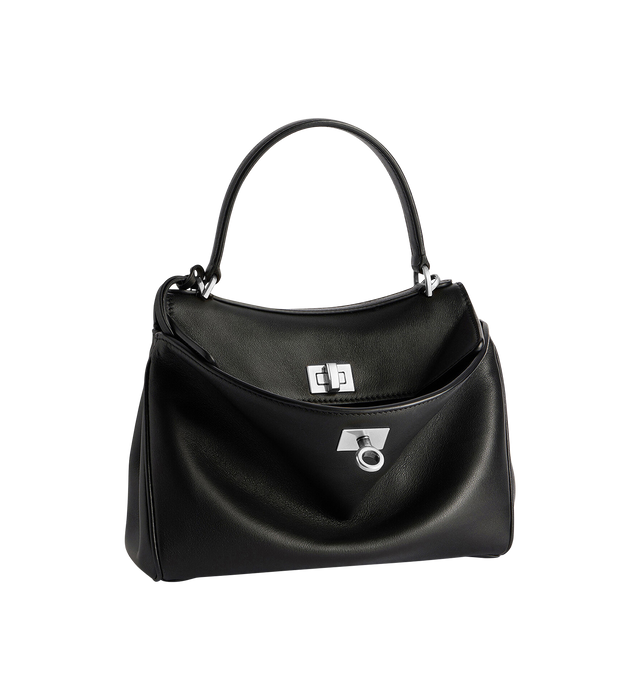 Image 2 of 5 - BLACK - BALENCIAGA Rodeo Handbag Mini featuring smooth calfskin, one handle hand carry, removable crossbody strap, removable cloche cls with two split rings, aged-silver hardware, turn lock closure, wide front pocket, 1 main compartment, 2 flat pockets at back, side snaps, 4 brass feet and nappa lambskin lining. 9" x 6.7" x 3.9". Calfskin. Made in Italy.