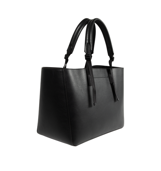 Image 2 of 3 - BLACK - MONCLER Carlo Leather Tote Bag featuring calf leather, micro suede lining, zipped pocket, adjustable leather handles and embossed and metal logo details. L 42 cm X H 31 cm X D 22 cm.