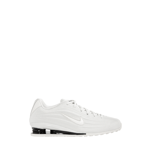 Image 1 of 5 - WHITE - NIKE Shox Z Sneaker featuring textile upper with rubber sole, lace-up front, cushioned textile footbed and lining, signature Swoosh at outer panels and modern low-profile with compressed heel columns.