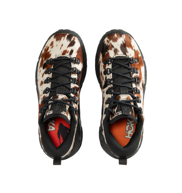 Image 5 of 5 - BROWN - HOKA Tor Summit+ Pony Hair Sneaker featuring pony hair leather upper, metal eyelets + hiking-style lacing system, Vibram Megagrip outsole for traction on varied terrain, cushioned midsole for long-wear comfort, pull tabs at heel and tongue for easy entry and ;ow-cut hiking silhouette.
