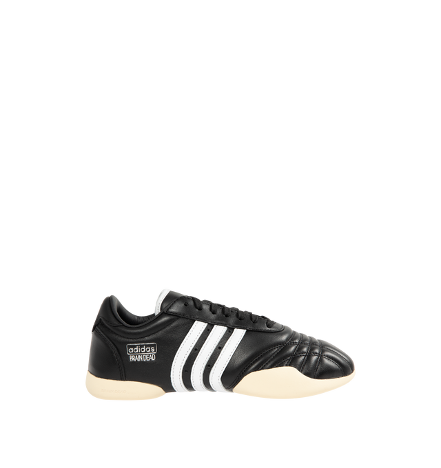 Image 1 of 5 - BLACK - ADIDAS Brain Dead Taekwondo Sneaker featuring regular fit, leather and synthetic upper, monochrome foil-branded premium leather, three-stripes, leather lining and rubber outsole.