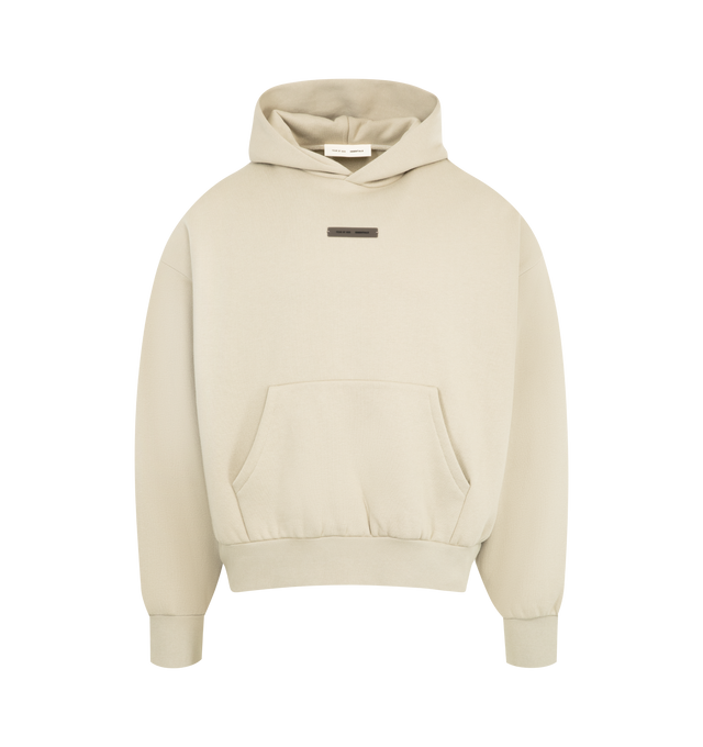 Image 1 of 2 - NEUTRAL - FEAR OF GOD ESSENTIALS Classic Fleece Hoodie made from 380gsm core fleece featuring a classic fit with signature Fear of God relaxed proportions. A new "Essentials Fear of God" beveled metallic logo is branded across the back. Details include a double-layer hoodie, kangaroo pocket, rib-knit cuffs and waist-hem. A "Fear of God Essentials" rubberized label is stitched on the hood and sleeve. 80% cotton, 20% polyester fleece.