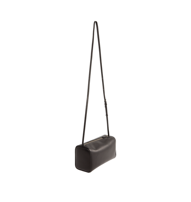 Image 3 of 4 - BROWN - THE ROW 90's Crossbody Bag in Leather featuring crossbody bag in smooth nappa leather with softly rounded edges, leather piping, and adjustable slim leather strap. 8.7 x 4.5 x 3.5 in. 100% lambskin leather. Made in Italy.