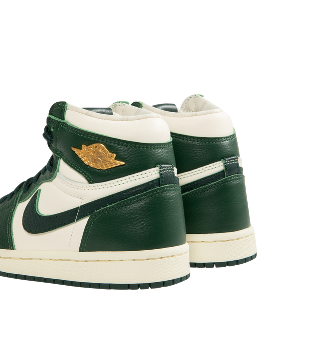 Image 3 of 5 - GREEN - JORDAN Air Jordan 1 Retro High OG Sneaker featuring brushed gold Wings logo, woven Nike Air tongue label, classic lightweight cushioning, padded collar and pristine finishes.