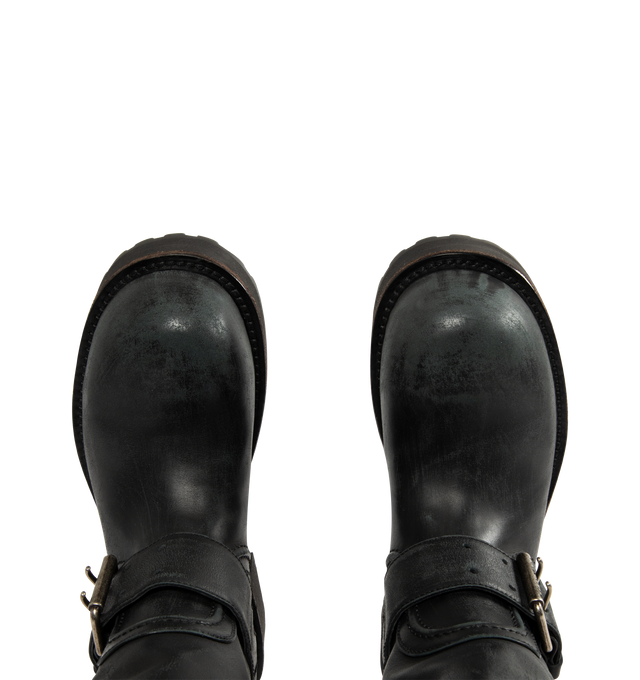 Image 4 of 4 - BLACK - BALENCIAGA Venom Boot featuring extra round toe, 20 mm arch, worn-out effect, adjustable straps with belt buckles, Balenciaga and 10 AV George V 75008 Paris logo debossed on the upper, plate with Balenciaga logo engraved on exterior outsole and thick toothed rubber outsole. Calfskin. Sole: micro, TPU, calfskin, zamac. Made in Italy.