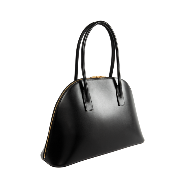 Image 2 of 3 - BLACK - SAINT LAURENT Sac De Jour Duffle featuring half-moon shape, full zip closure, elongated straps, providing both hand and shoulder carry options, leather lining, bronze-tone hardware, one zip pocket and five metal feet. 16.5" x 10.8" x 0.84.7". Calfskin leather. Made in Italy.