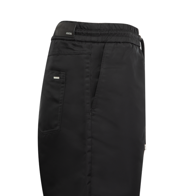 Image 4 of 4 - BLACK - AMIRI Hollywood Drawstring Woven Shorts featuring regular fit, high-rise, drawstring elasticated waistband, two slip pockets, brand embroidery at front, two patch pockets and brand patch at back. 100% polyamide. Made in Italy.