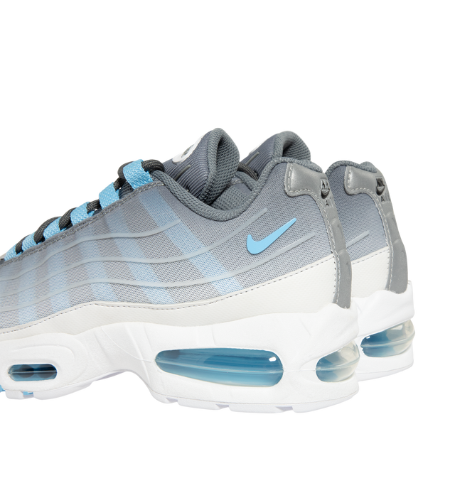 Image 3 of 5 - BLUE - Nike Men's Air Max 95 Big Bubble Sneaker featuring textile and synthetic leather, visible Max Air cushioning, flex grooves in the midsole and outsole, foam midsole and rubber outsole.