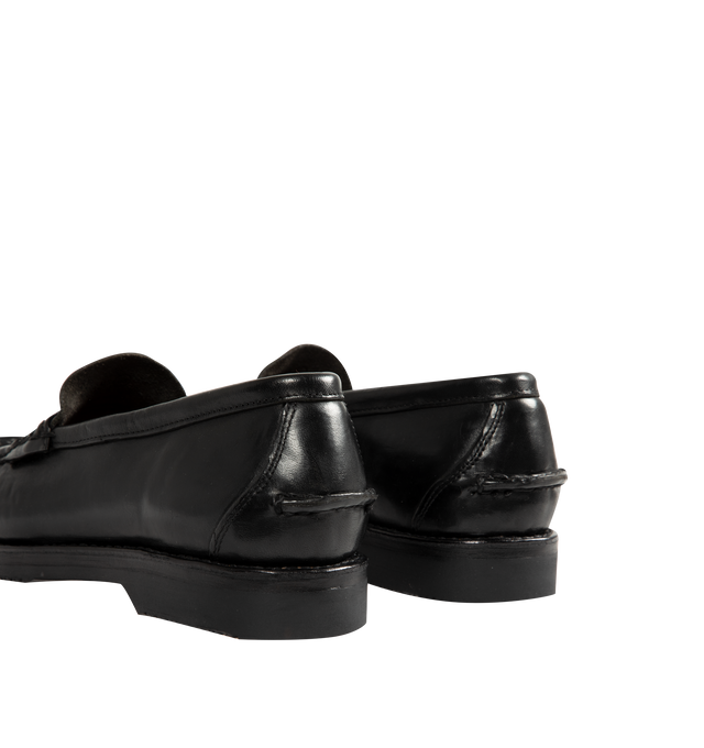 Image 3 of 4 - BLACK - Visvim Men's Fabro-Folk Leather Loafers are crafted from Italian vegetable-tanned horsehide and feature a minimalist penny loafer silhouette with hand-sewn construction and Goodyear-welted detailing. Designed with a pigment-free leather lining, natural cork insole, leather welt and midsole, and a Vibram outsole for lasting comfort, durability, and resoling capability. Main Material: Italian Vegetable-Tanned Horsehide. Lining: Pigment-Free Leather. Insole: Natural Cork. Midsole: Leathe