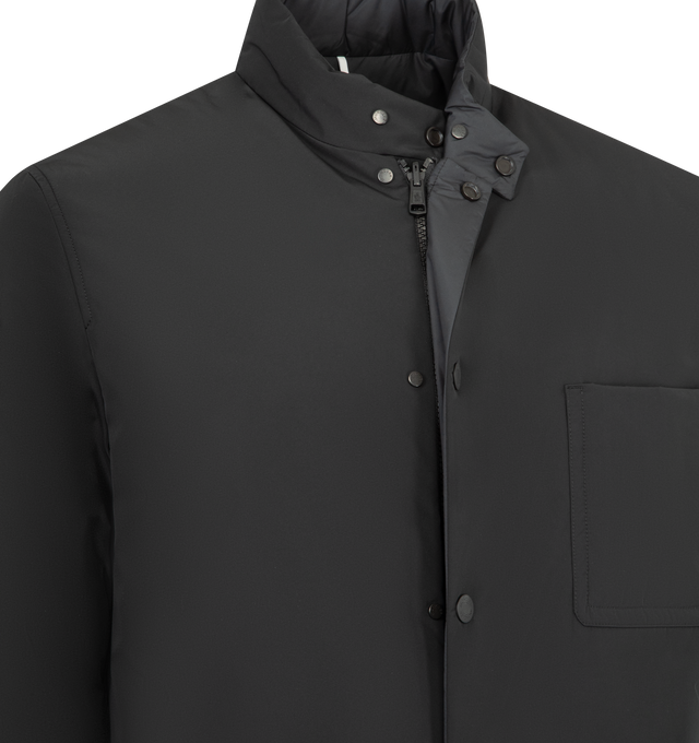 Image 5 of 5 - BLACK - MONCLER Ouille Reversible Short Down Jacket featuring aquaflect, water-repellent main fabric, Airsoft lining, reversible, down-filled, zip and snap button closure, side pockets, inner pockets with zip and snap button closure and leather logo patch. 100% polyester. Padding: 90% down, 10% feather. Made in Romania.