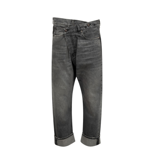Image 1 of 3 - BLACK - R13 Crossover Jeans featuring fading, whiskering, and distressing throughout, belt loops, five-pocket styling, offset button-fly, raw edge at rolled cuffs and logo patch at back waistband. 100% cotton. Made in Italy.