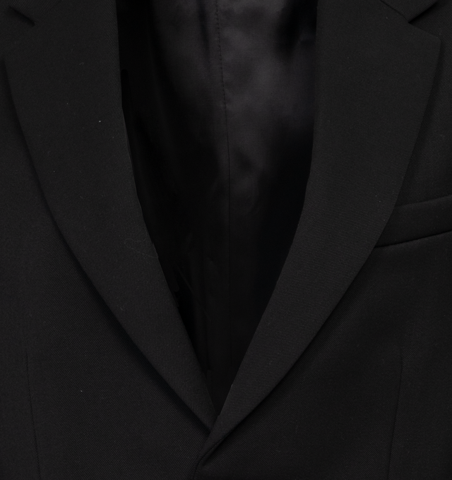 Image 3 of 3 - BLACK - WARDROBE.NYC Oversized Single-Breasted Blazer featuring notch lapels, long sleeves, button accent at cuffs, chest welt pocket and front flap pockets. 100% virgin wool. 