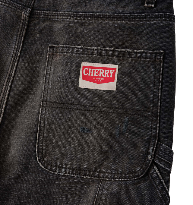 Image 3 of 6 - BLACK - Cherry LA Wide Leg Double Knee Pants are crafted from durable cotton canvas and feature a wide-leg silhouette with reinforced double-knee construction. Designed with a vintage-washed finish and distressed detailing throughout, this workwear-inspired style is finished with branded nickel hardware and a signature logo label at the back pocket. Main Material: Cotton Canvas. Fit: Wide Leg. Made in Los Angeles, California.