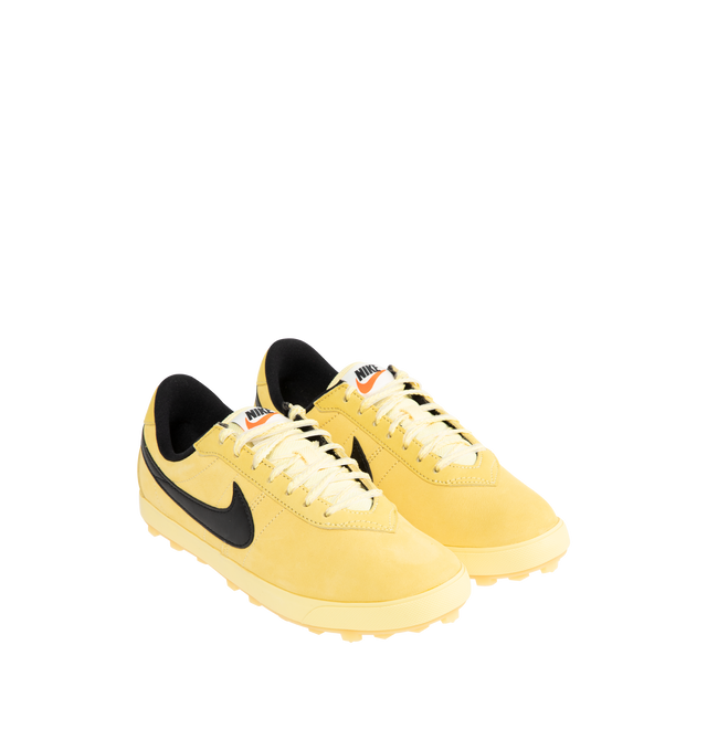Image 2 of 5 - YELLOW - NIKE Astrograbber Sneaker featuring an American football shoe with a leather upper, padded, low-cut collar, tonal rubber midsole and waffle outsole.