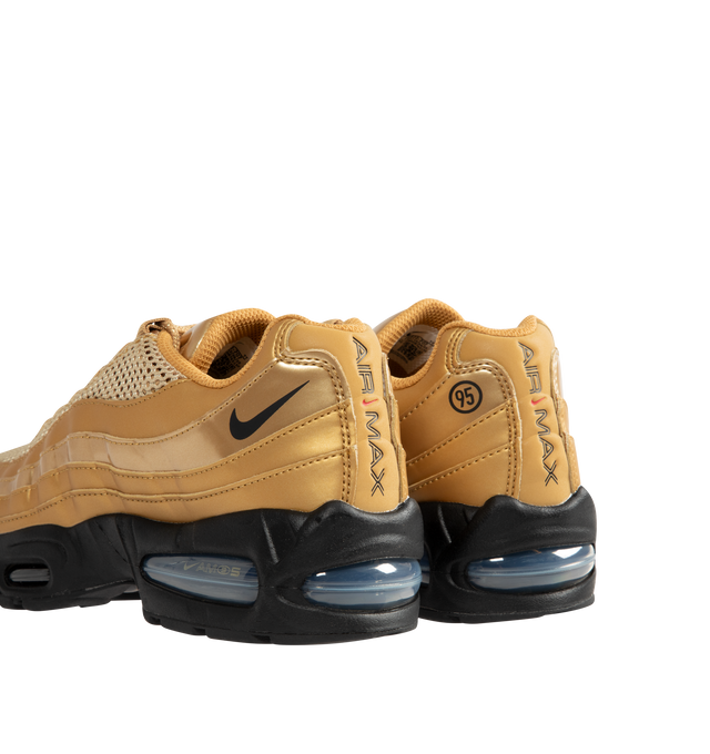 Image 3 of 5 - GOLD - NIKE Air Max 95 "Big Bubble" Sneaker featuring upper that combines synthetic leather with airy textiles for a layered, visible Max Air cushioning, flex grooves in the midsole and outsole, foam midsole and rubber outsole.