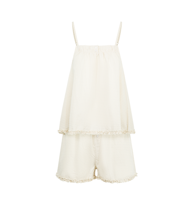 Image 1 of 6 - WHITE - DEIJI STUDIOS Yoke Set featuring relaxed babydoll top, straight neckline with button closure, gathered yoke seam, lettuce frill hem detail and fine, adjustable straps pairs back with an easy pull on short featuring double button detailing, elastic waistband and baby lock lettuce frill hem. 100% organic cotton poplin.