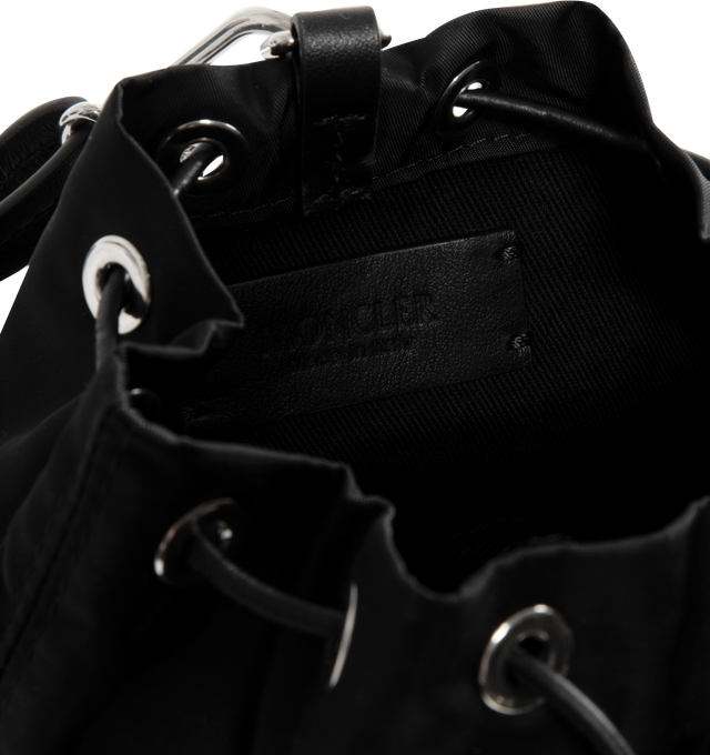 Image 3 of 3 - BLACK - MONCLER Double Pouch featuring nylon drill, cotton drill lining, mini zipped pouch, mini pouch with drawstring closure, leather wrist strap and metal logo. H 7.5 cm x L 7.5 cm x D 2 cm and H 11 cm x L 8 cm x D 8 cm. 100% polyamide/nylon. Made in Italy.