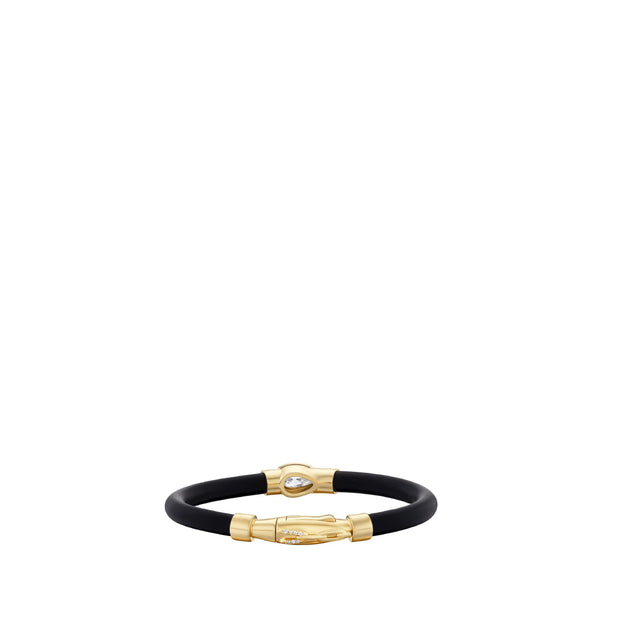 Image 2 of 3 - GOLD - Uniform Object Carbon Bracelet featuring 14 g of 18K yellow gold with a 1.01 ct pear brilliant diamond and 0.20 TCW round diamond accents. Handcrafted in New York City. Features an Italian-made hypoallergenic rubber band designed for comfort and durability. Hirshleifers offers a range of pieces from this collection in-store. For personal consultation and detailed information about jewelry, please contact our dedicated stylist team at personalshopping@hirshleifers.com.