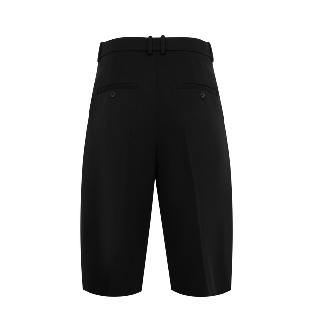 Image 2 of 3 - BLACK - SAINT LAURENT Bermuda Classique Shorts featuring high-waisted, wide leg, center crease, double pleat, concealed front button and hook closure, zip fly, two slash pockets at the front, two welt pockets with button at the back and waistband with belt loops. 100% wool. Made in Italy.