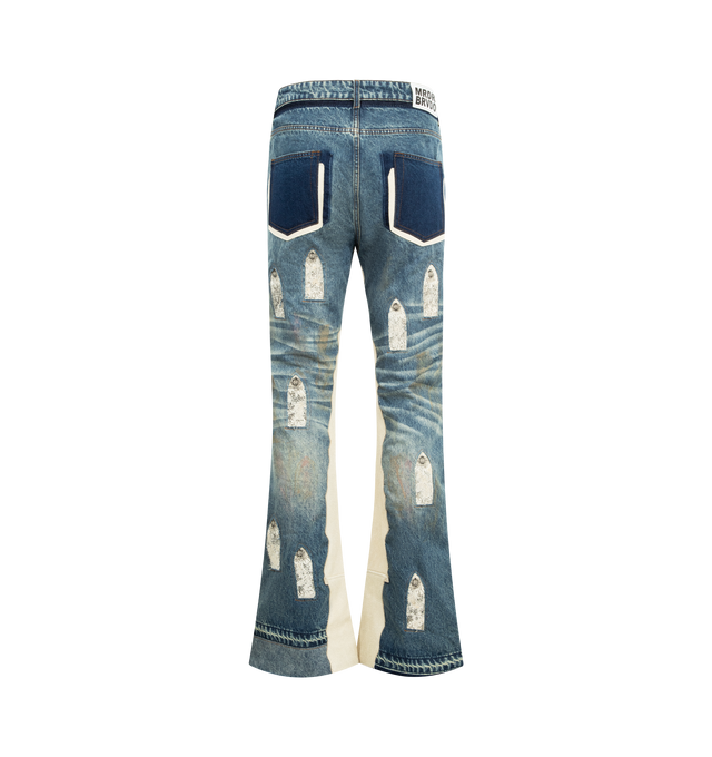 Image 2 of 3 - BLUE - WHO DECIDES WAR Howdy Denim featuring a slim straight fit, embellished with signature stained glass leather patches, patches embedded in the denim and accents follow on the inseam and pockets. 100% cotton.