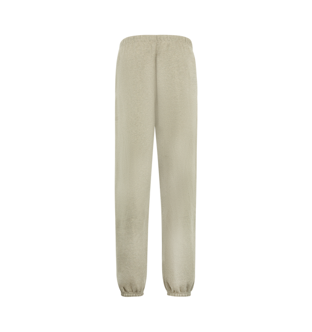 Image 2 of 3 - NEUTRAL - Fear of God Essentials Mens Classic Sweatpants are crafted from heavyweight 380 GSM cotton-blend core fleece. Feature a classic relaxed fit with tapered legs, elasticized waistband with bungee drawcord, side-seam pockets, elastic ankle cuffs, puff-printed Fear of God and Essentials branding, and an Essentials logo label. Main Material: 80% Cotton, 20% Polyester.