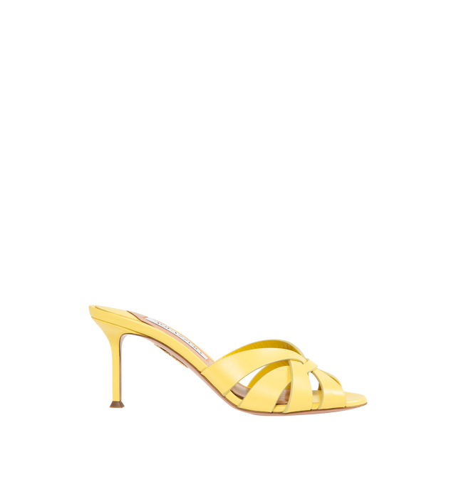 Image 1 of 4 - YELLOW - AQUAZZURA Copacabana Mule 75 featuring cage-like straps, low-cut vamp, slip-on style, mid heel, padded leather insole and signature logo detailing. 75 mm heel. Calf leather. Made in Italy.