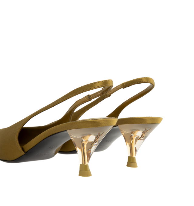 Image 3 of 4 - GOLD - Saint Laurent Women's Fanny Slingback Pumps are crafted from certified viscose and certified silk and feature a translucent silhouette with a pointed cap toe and a Plexiglas kitten heel embedded with the signature bronze-tone CASSANDRE. Designed with an elasticized slingback strap, the elegant pair is finished with a leather sole and a round Saint Laurent-engraved metal plaque at the insole. Main Material: Certified Viscose, Certified Silk. Sole: Leather. Closure: Elasticized Slingback