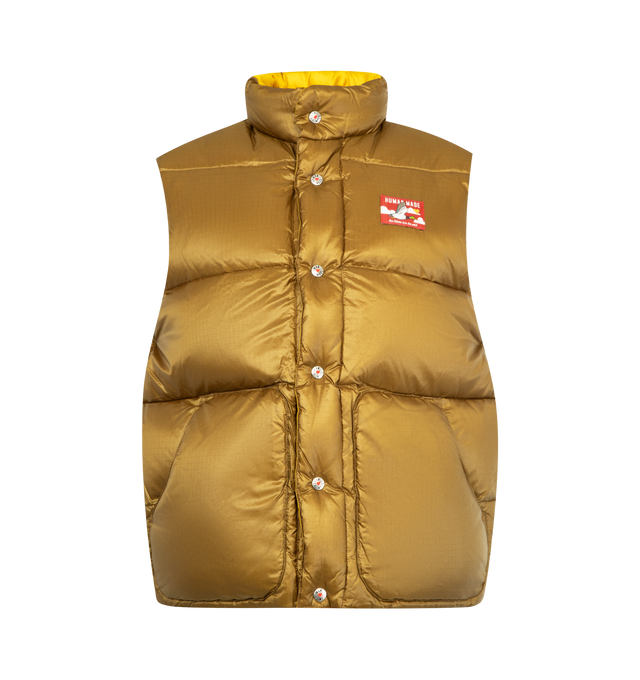 Image 1 of 3 - YELLOW - HUMAN MADE Reversible Down Vest featuring nylon ripstop fabric with down and feather filling, lightweight material with a shiny appearance, reversible design combines dark and light colors, dark-toned side features a duck name tag, light-toned side has a heart patch, quilt stitching forms a heart on the back, both sides have two front pockets and logo snap button closure. 100% nylon.