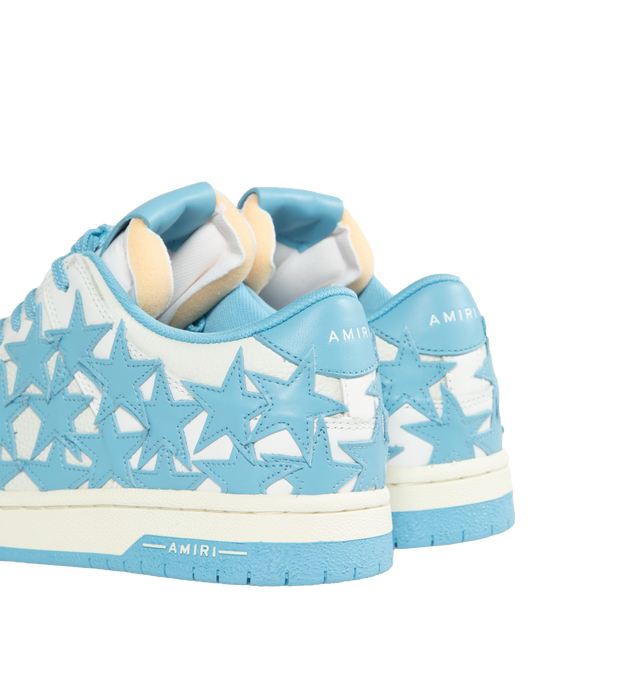 Image 3 of 5 - BLUE - AMIRI Stars Leather Low-Top Sneakers featuring flat heel, round toe, logo on the tongue and heel, lace-up vamp, star clusters on the side and rubber outsole. 