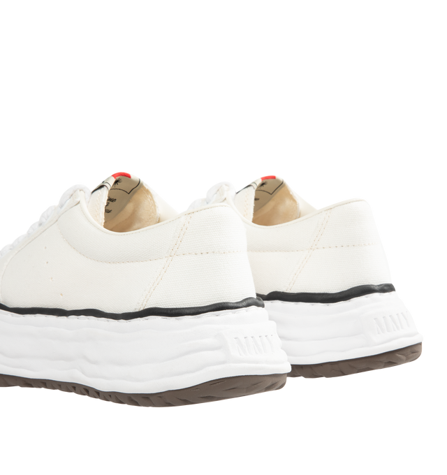 Image 3 of 5 - WHITE - Maison Mihara Yasuhiro Men's Eric Sneakers feature the brand's signature hand-sculpted OG sole, a mixed-material suede and canvas upper, and distinctive toe stitching for a bold contemporary look. Designed for the Spring/Summer 2026 collection, these designer low-top sneakers combine Maison Mihara Yasuhiro's experimental aesthetic with everyday comfort, while the handcrafted-inspired sole and intentional vintage detailing create a truly distinctive silhouette. Main Material: Cow Leath