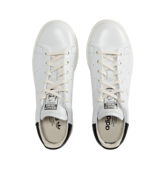 Image 5 of 5 - WHITE - ADIDAS Originals Stan Smith Lux Shoes with a clean and genderless look that nods to the OG, elevated with premium details. The court-inspired shoe is crafted entirely from buttery-soft leather with leather inner lining and an extra leather patch in the heel that provides heightened comfort and durability. Featuring foil branding on the tongue, lace closure, and 360-degree stitching around tooling. Unisex style in men's sizes.