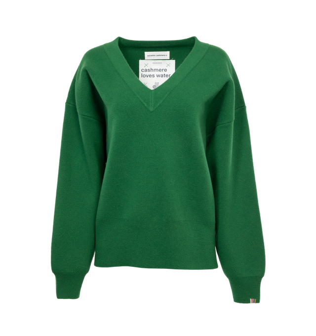 Image 1 of 3 - GREEN - EXTREME CASHMERE Lana Sweater featuring voluminous sleeves, ribbed V-neck, drop shoulder, long sleeves, ribbed cuffs and hem and signature embroidered-detail to the cuff. 100% cashmere. 