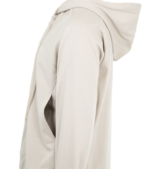 Image 3 of 3 - WHITE - RICK OWENS Windbreaker Hoodie featuring a paneled design, drawstrings at the hood, patch pockets at the waist, front zip closure and elasticized cuffs and hem. 100% cotton. Made in Italy.